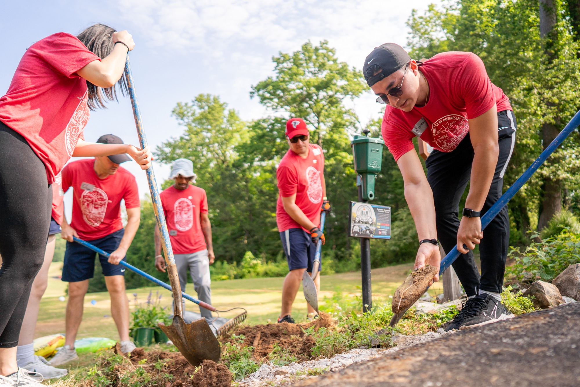 Associates packing meals for communities in need